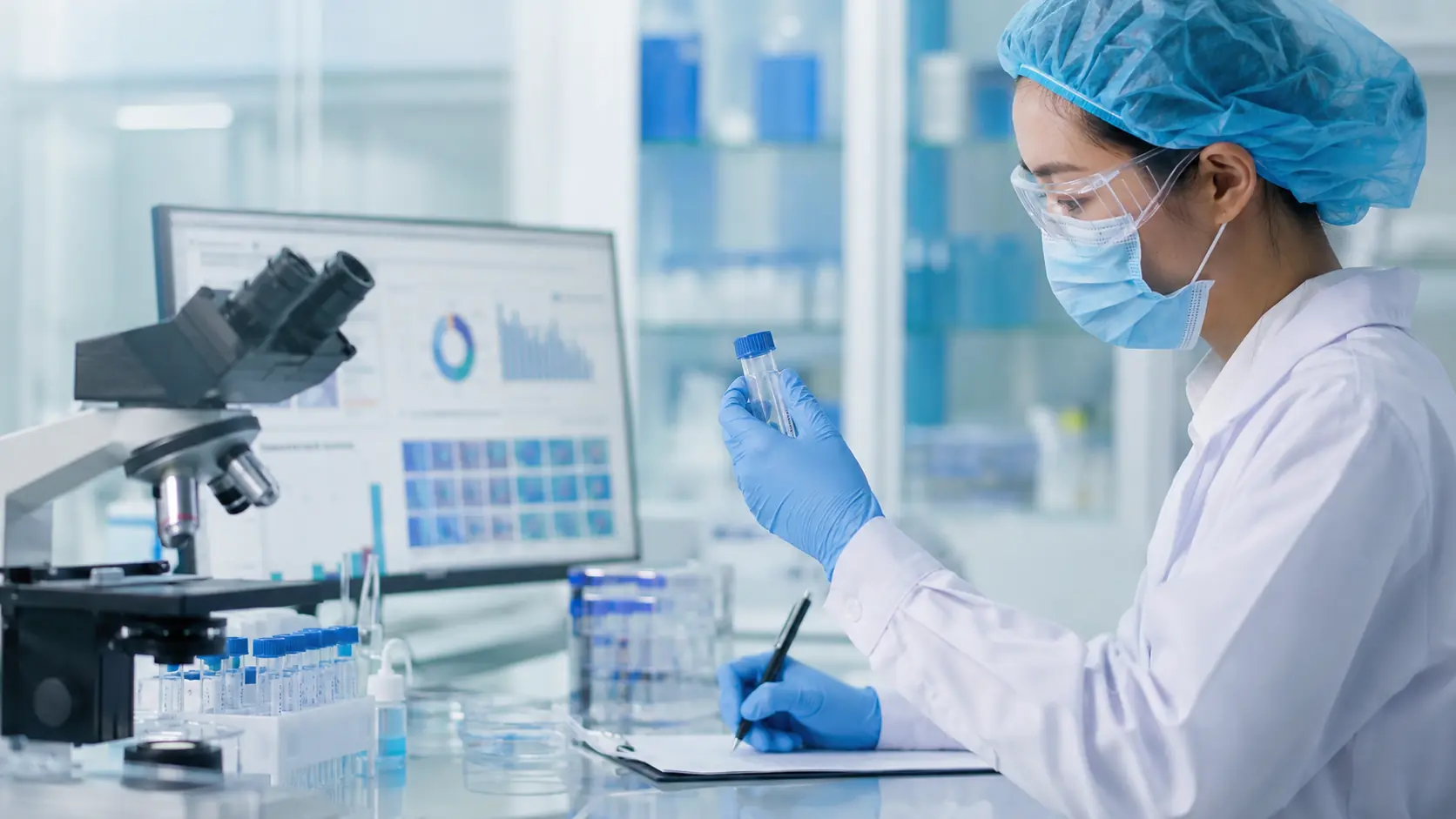 Laboratory specialist performing safety checks on a cellular product