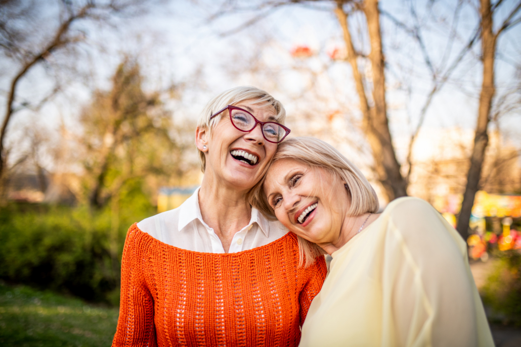 A woman after COPD integrative treatment with her friend smiling