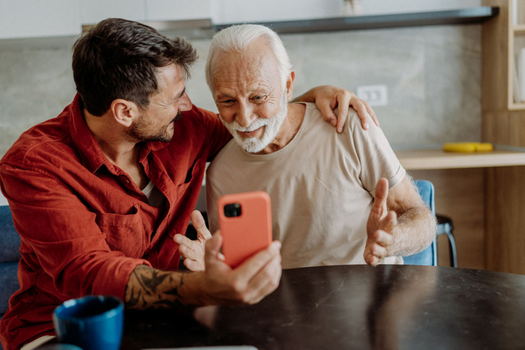 a man with Parkinson’s after his integrative therapy and his son